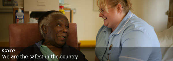 Nurse smiling with elderly person